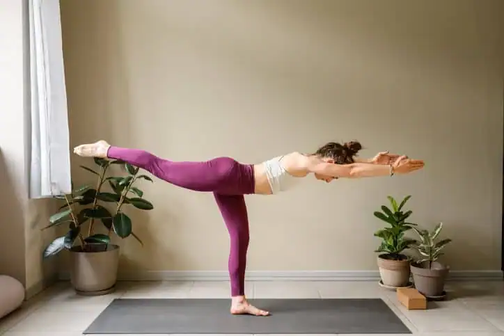 Woman doing Yoga exercise Bicester to help with toning the body. 