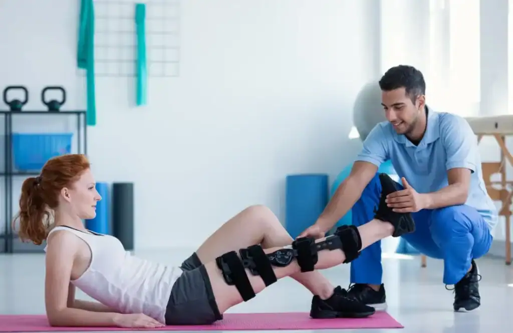 Woman having treatment to help muscle recovery Bicester after an injury